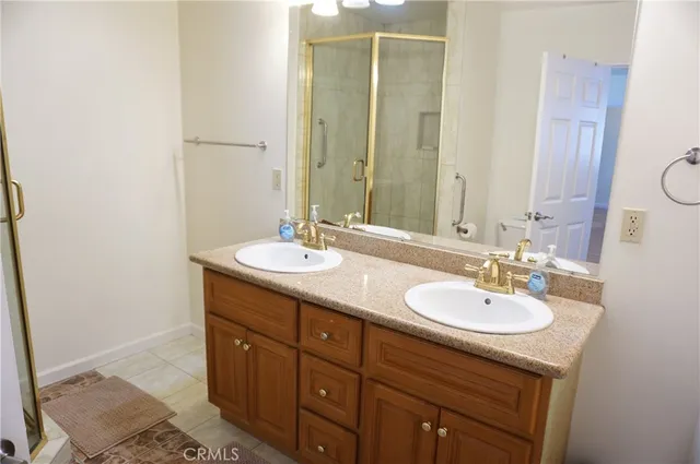 a bathroom with a toilet and a mirror