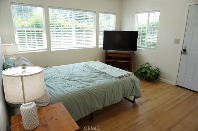 a bathroom with a glass shower door