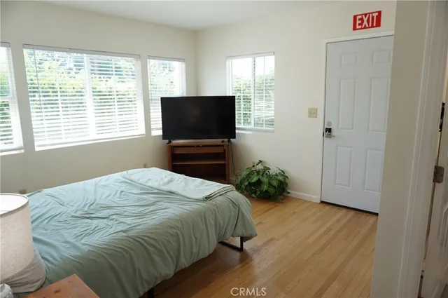 a bathroom with a glass shower door