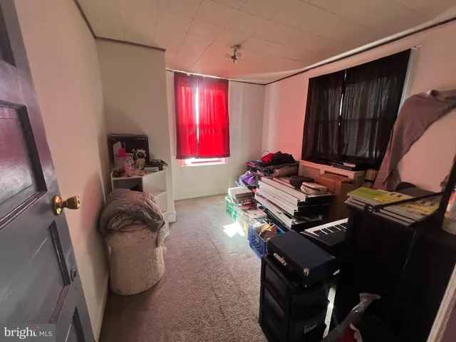 a room with furniture and a window