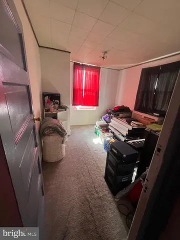 a room with furniture and a flat screen tv