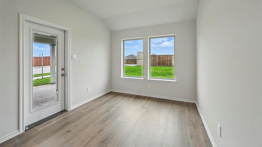 506 Lantana Road Princeton, TX 75407 - Photo 31 of 35 wooden floor in an empty room with a window
