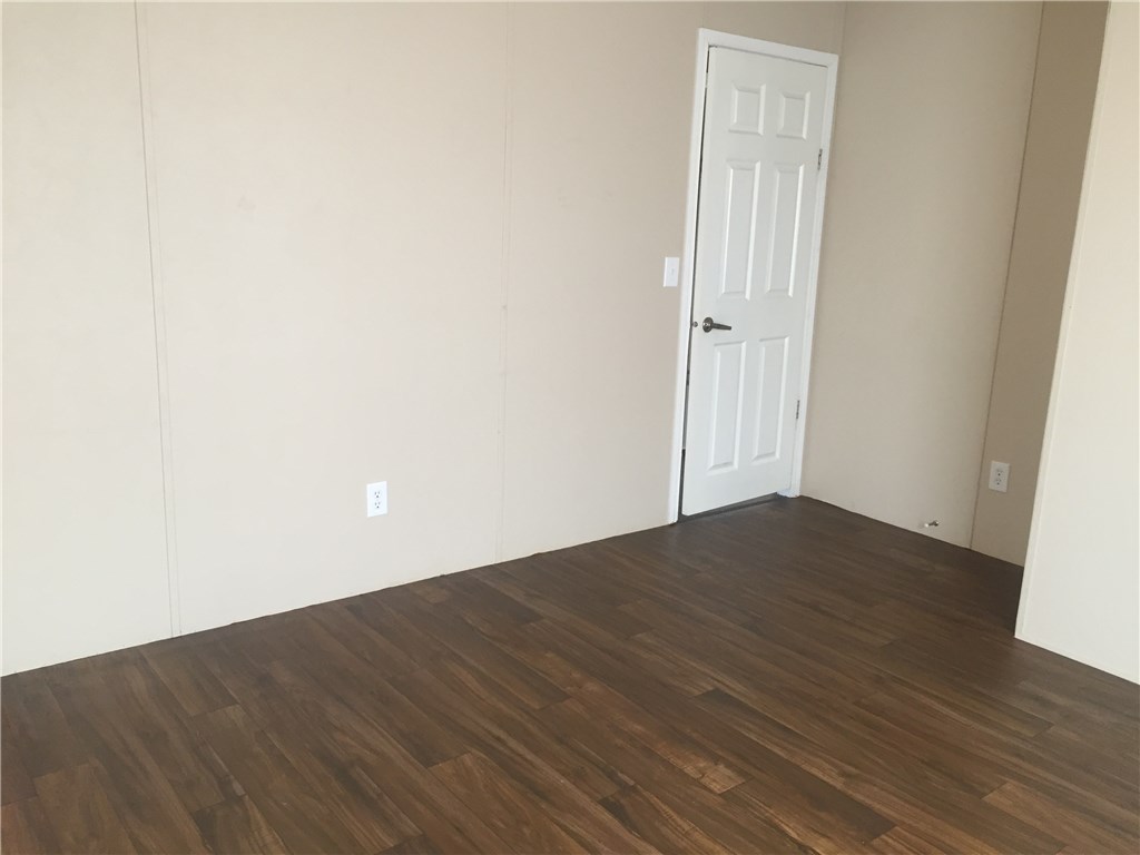 35611 Quail Road Callahan, FL 32011 - Photo 15 of 22 an empty room with wooden floor