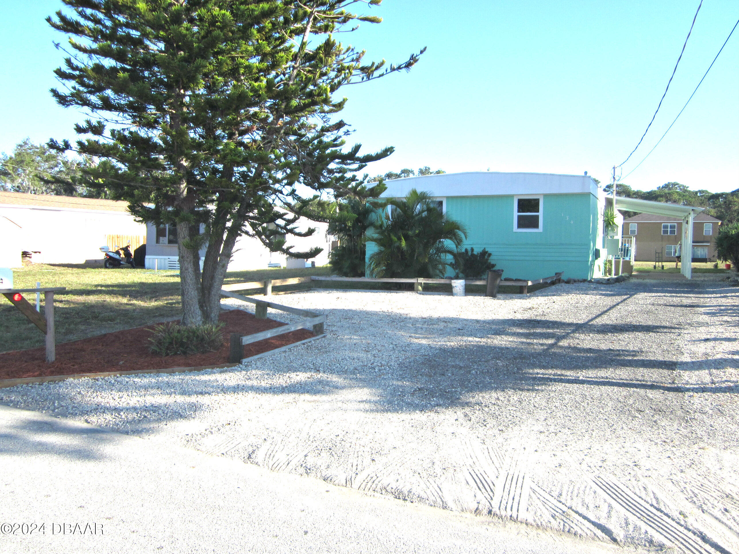 134 Douglas Street Edgewater, FL 32141 - Photo 1 of 20 a view of a house with a yard