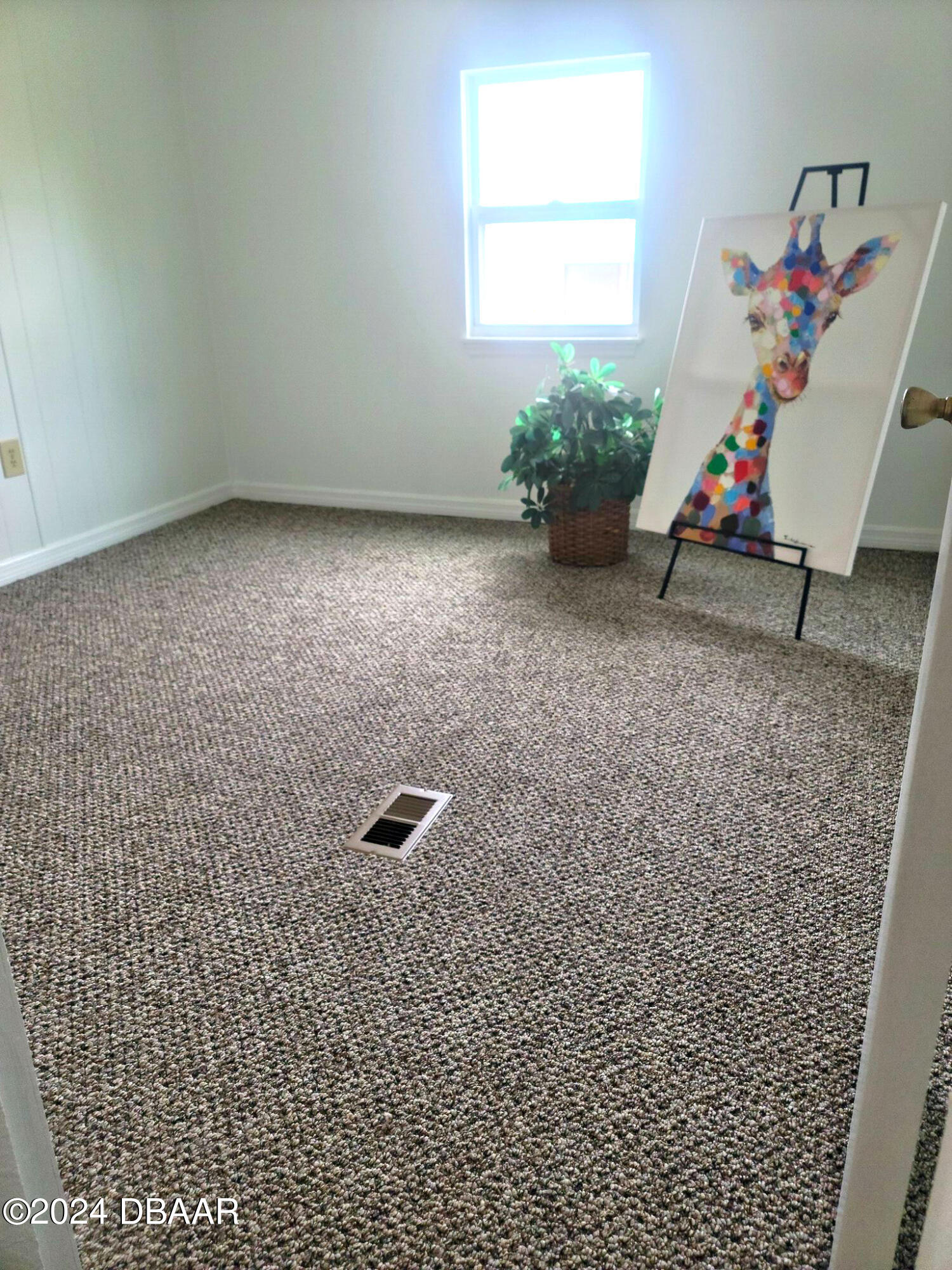 134 Douglas Street Edgewater, FL 32141 - Photo 13 of 20 a room with furniture and window