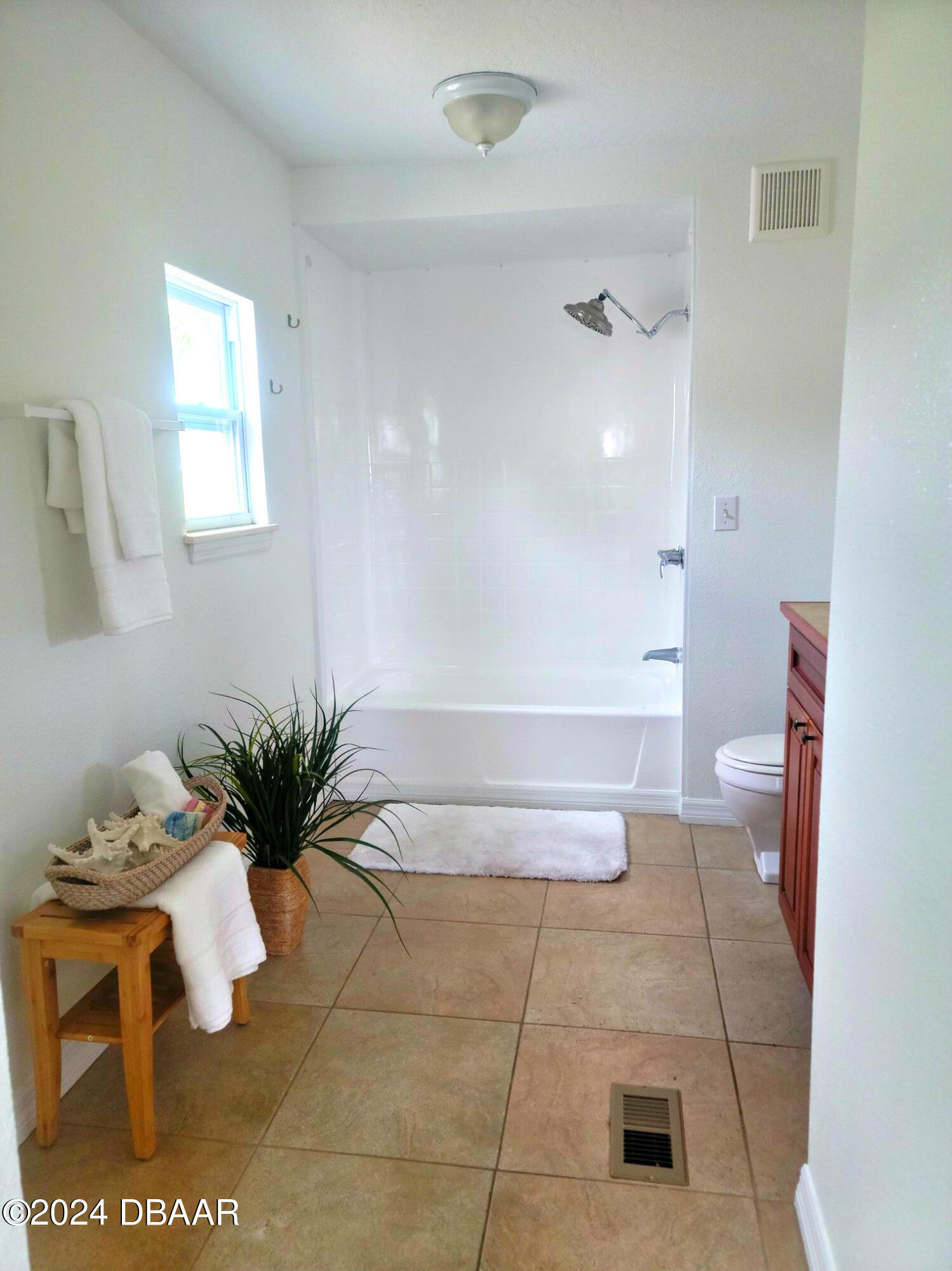 134 Douglas Street Edgewater, FL 32141 - Photo 18 of 20 a bathroom with a shower