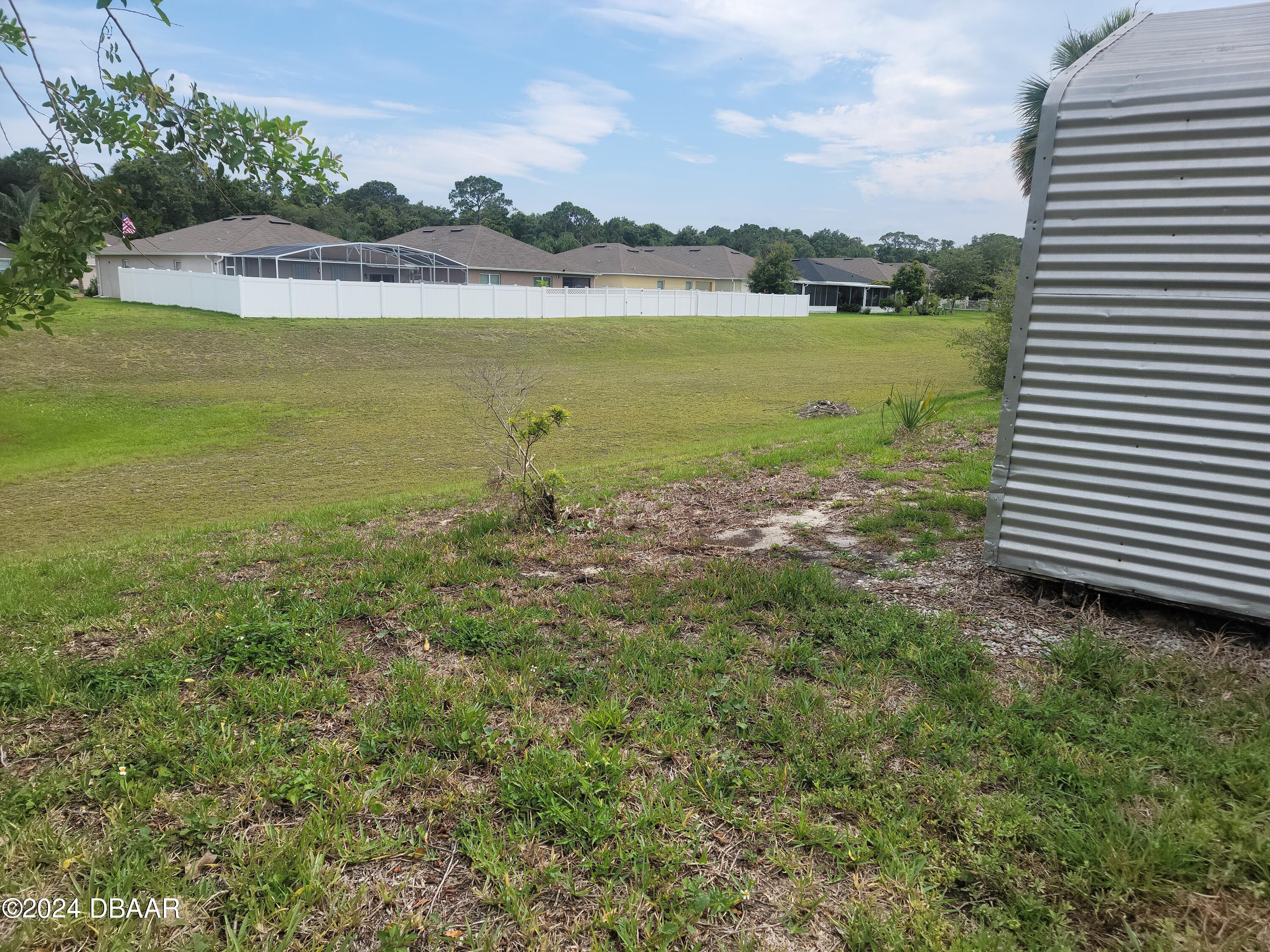 134 Douglas Street Edgewater, FL 32141 - Photo 20 of 20 a view of an ocean and beach