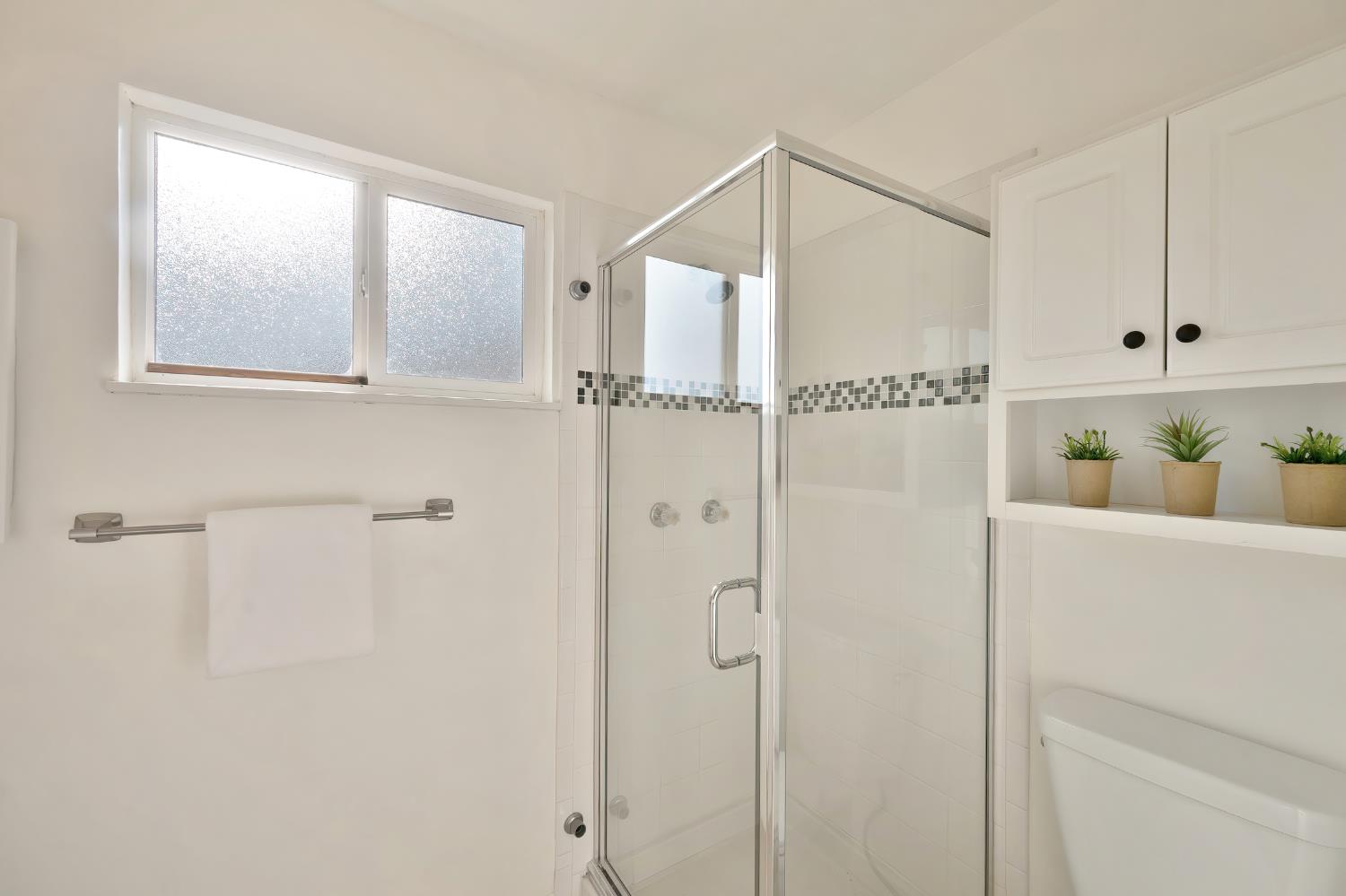 2329 Sabine Way Rancho Cordova, CA 95670 - Photo 16 of 21 a bathroom with a shower and a shower