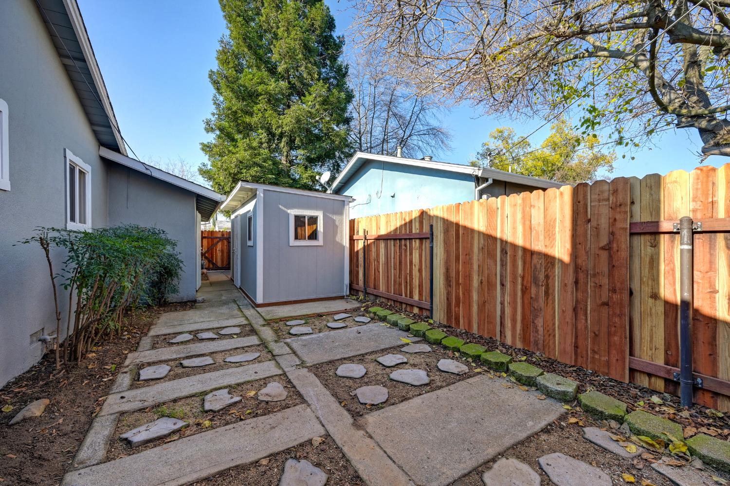 2329 Sabine Way Rancho Cordova, CA 95670 - Photo 20 of 21 a backyard of a house with chairs and a table