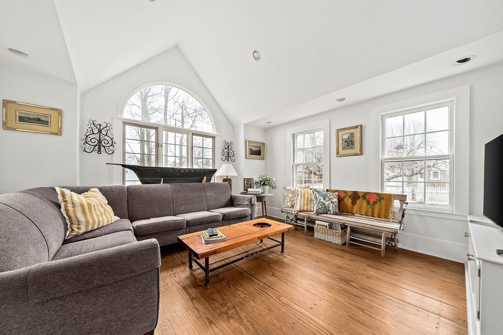 99 Beaver Dam Road Scituate, MA 02066 - Photo 8 of 41 a living room with furniture and a large window