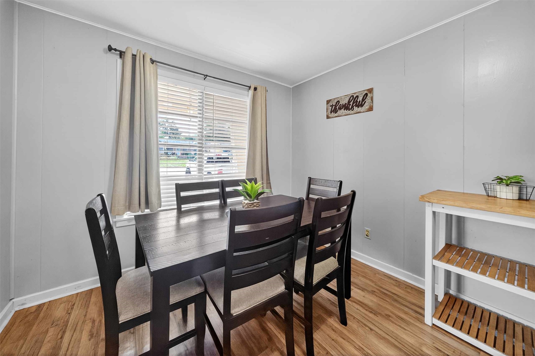 306 4th Street Palestine, TX 75803 - Photo 2 of 34 a view of a dining room with furniture window and wooden floor