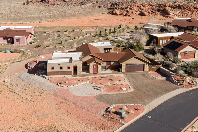4173 Shadowfax Run, Unit 5 Moab, UT 84532 - Photo 2 of 41 Overview of rural landscape featuring a desert landscape