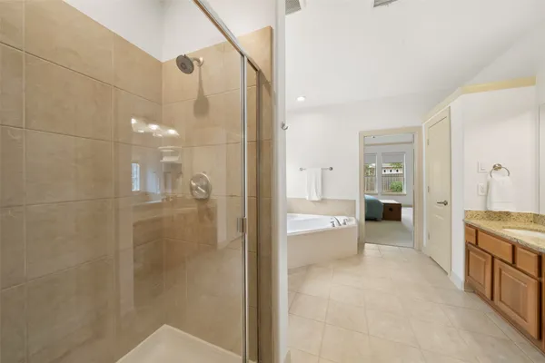 $998,000 | 15 Heather Bank Place, The Woodlands, TX 77382