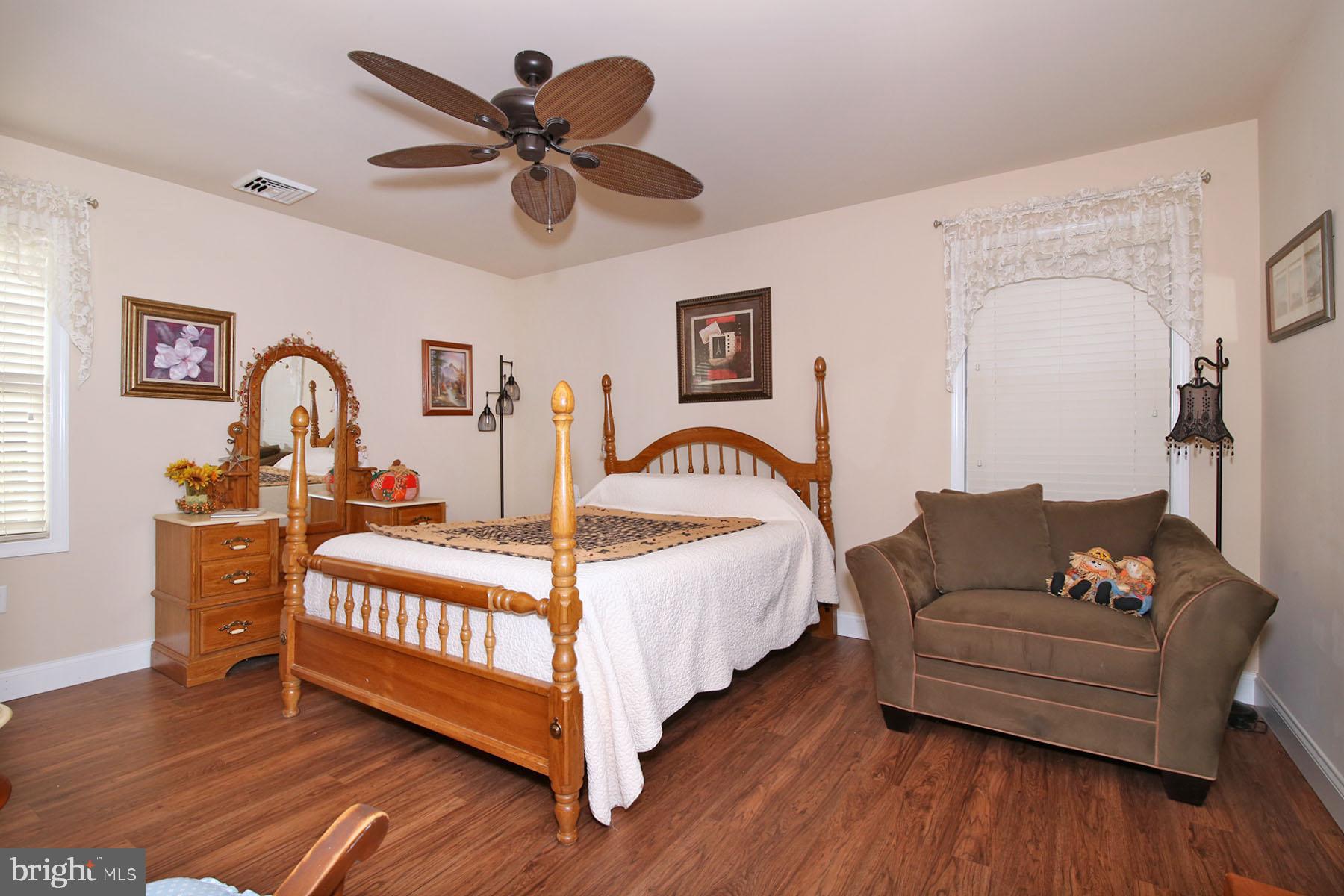 1122 Alden Way Lebanon, PA 17042 - Photo 19 of 66 a bedroom with a bed and wooden floor