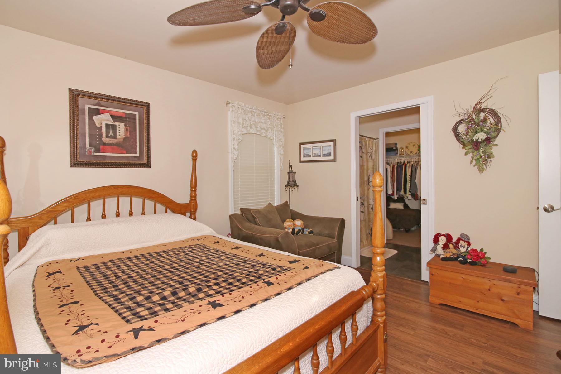 1122 Alden Way Lebanon, PA 17042 - Photo 21 of 66 a bedroom with a bed and dresser with wooden floor