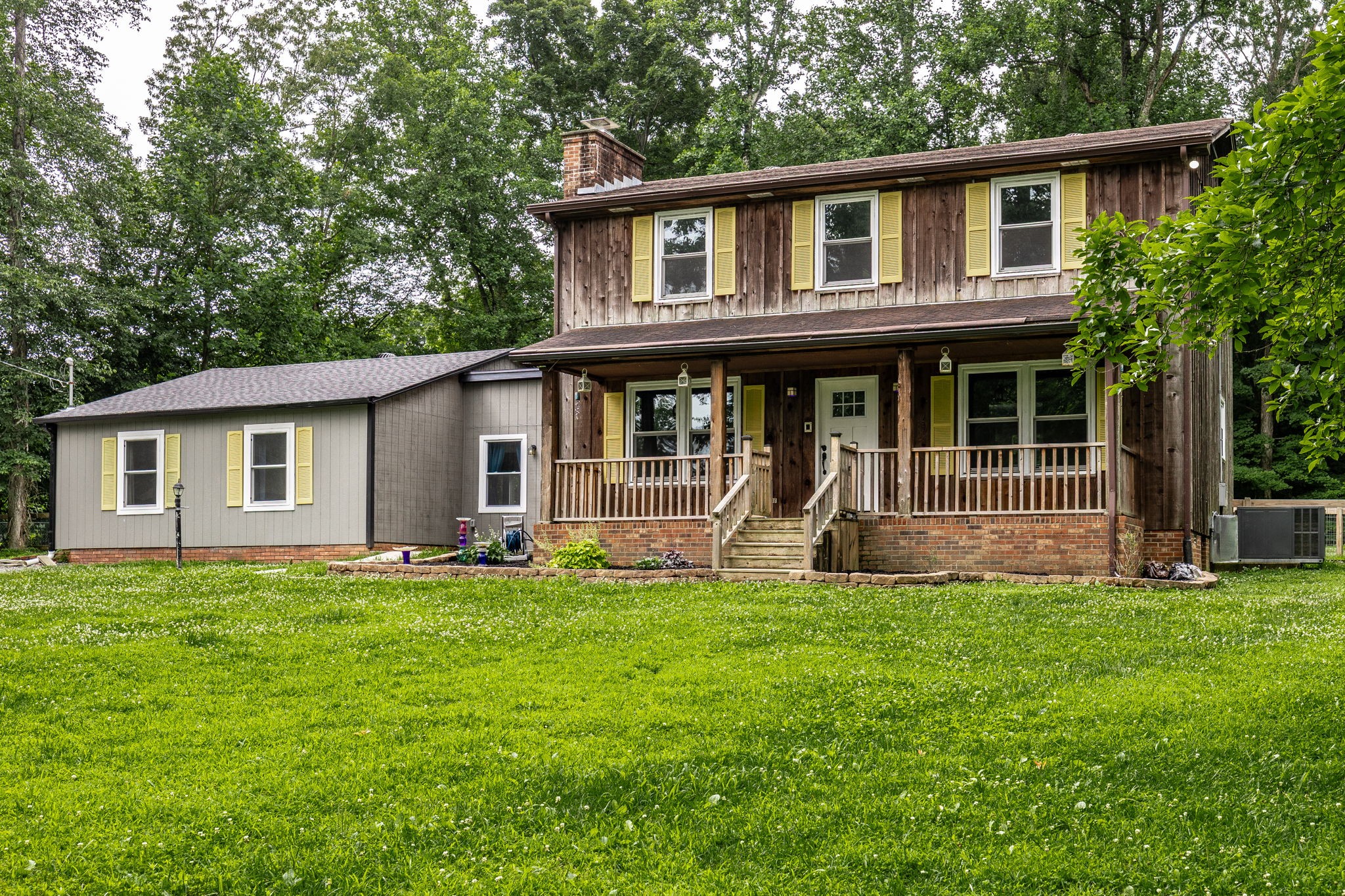 13989 Owens Chapel Road Springfield, TN 37172 - Photo 1 of 43 a front view of a house with a yard and porch