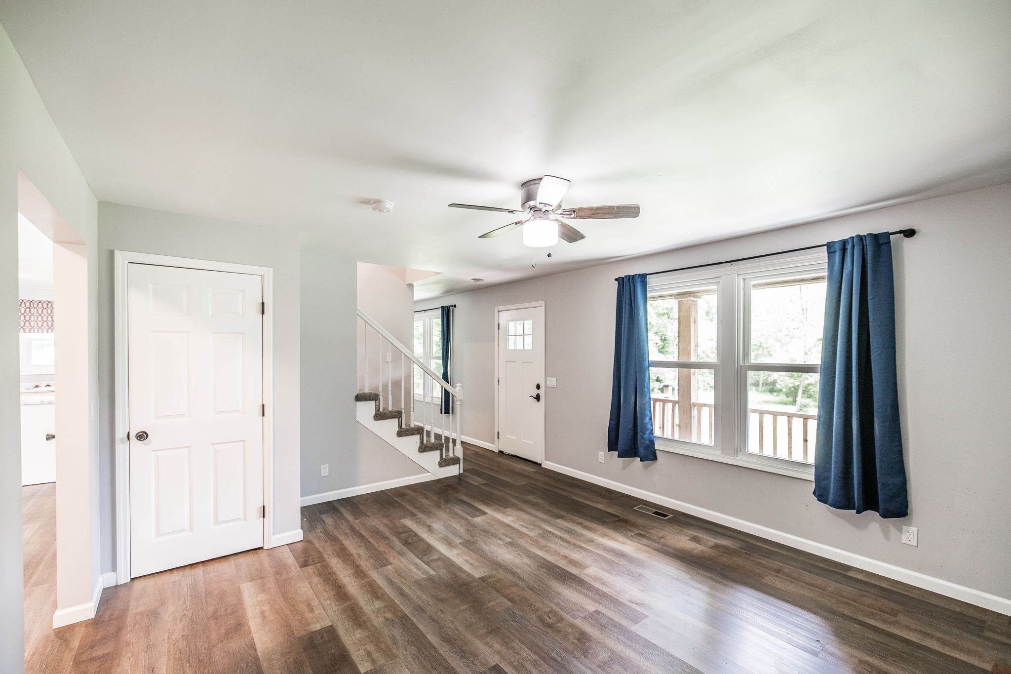 13989 Owens Chapel Road Springfield, TN 37172 - Photo 25 of 43 a view of an empty room with wooden floor and a window