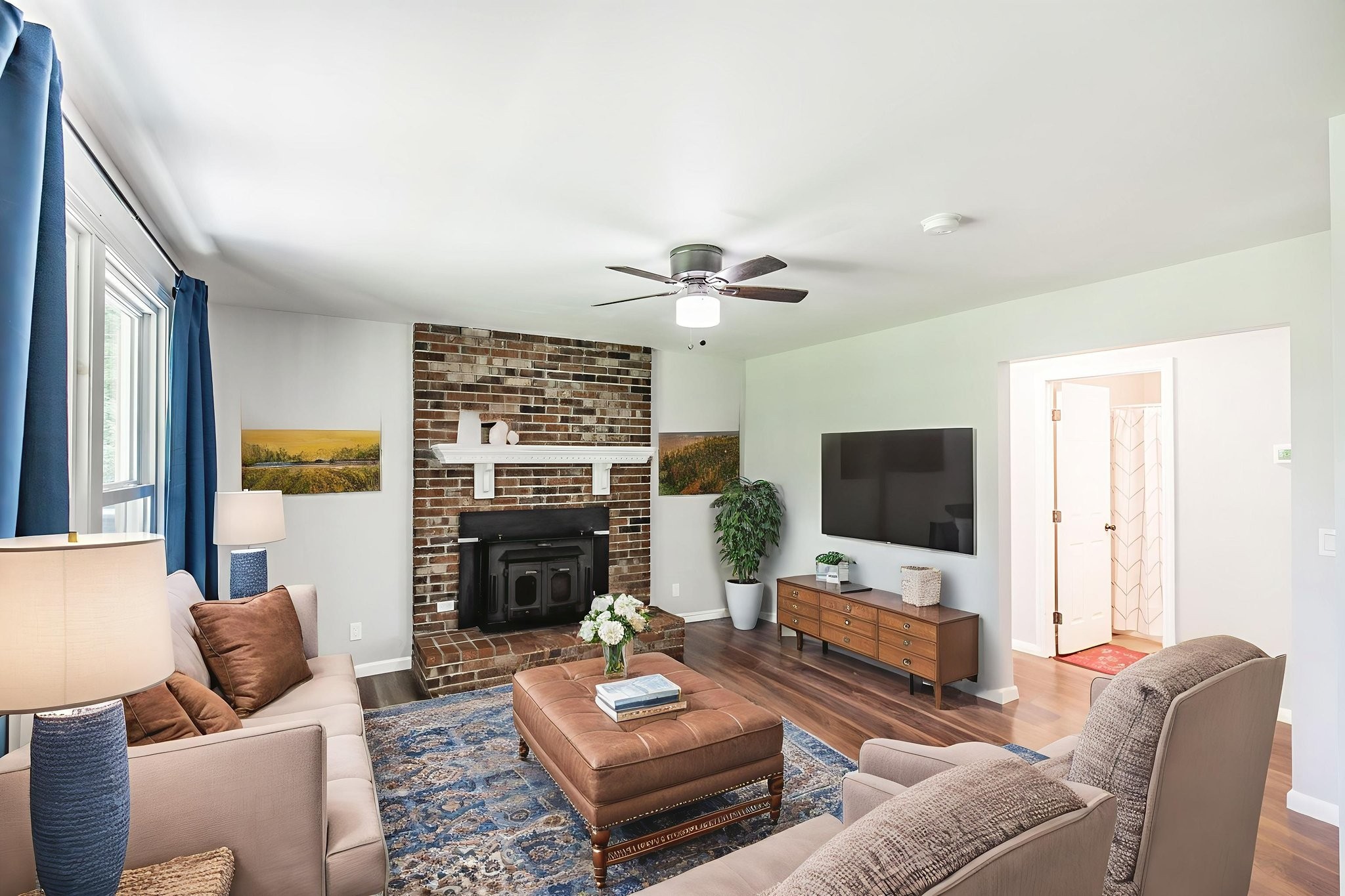 13989 Owens Chapel Road Springfield, TN 37172 - Photo 3 of 43 a living room with fireplace furniture and a flat screen tv