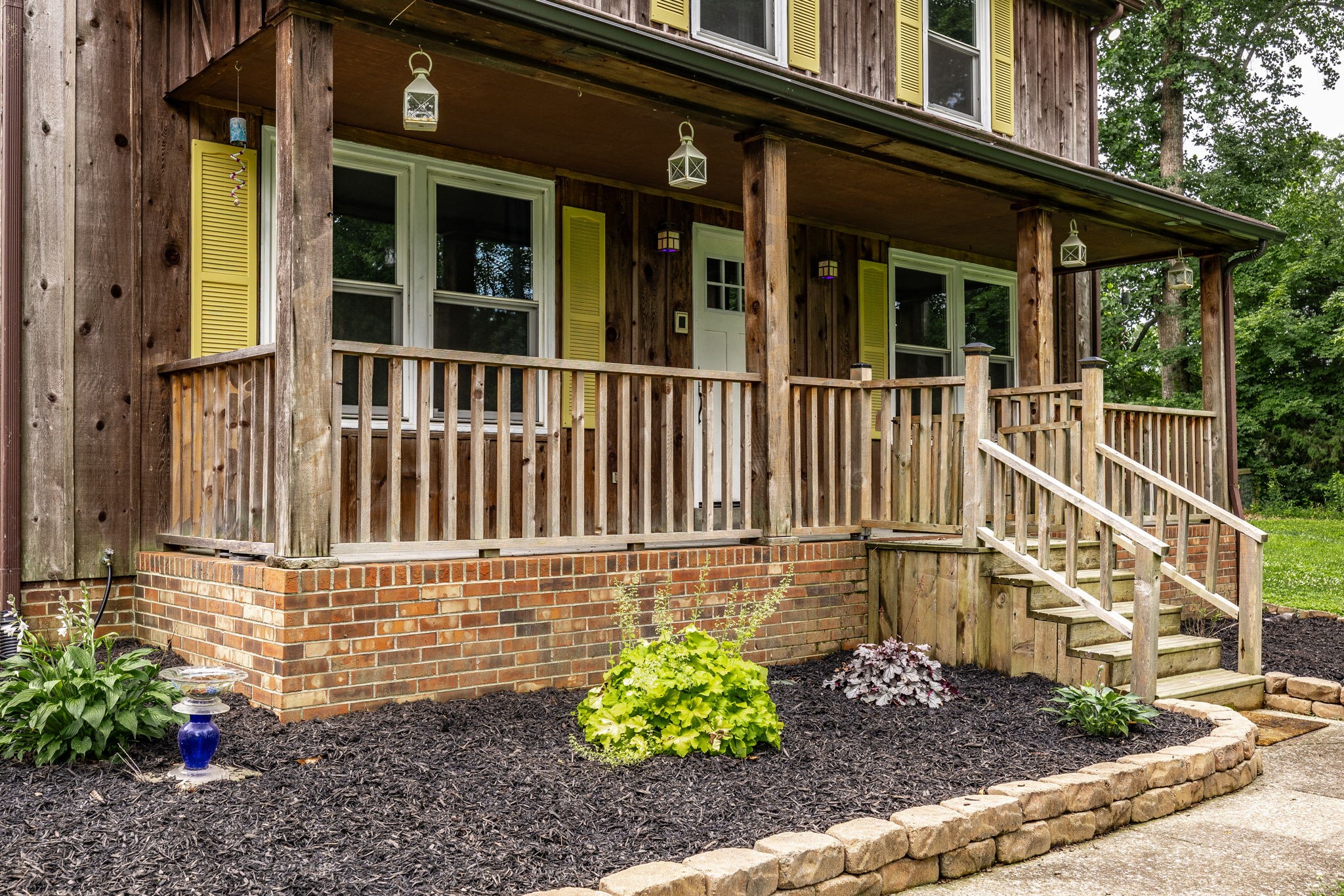 13989 Owens Chapel Road Springfield, TN 37172 - Photo 31 of 43 a view of a house with a window and flower plants