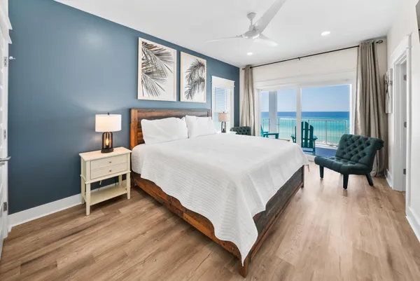a bedroom with a bed and a table in it