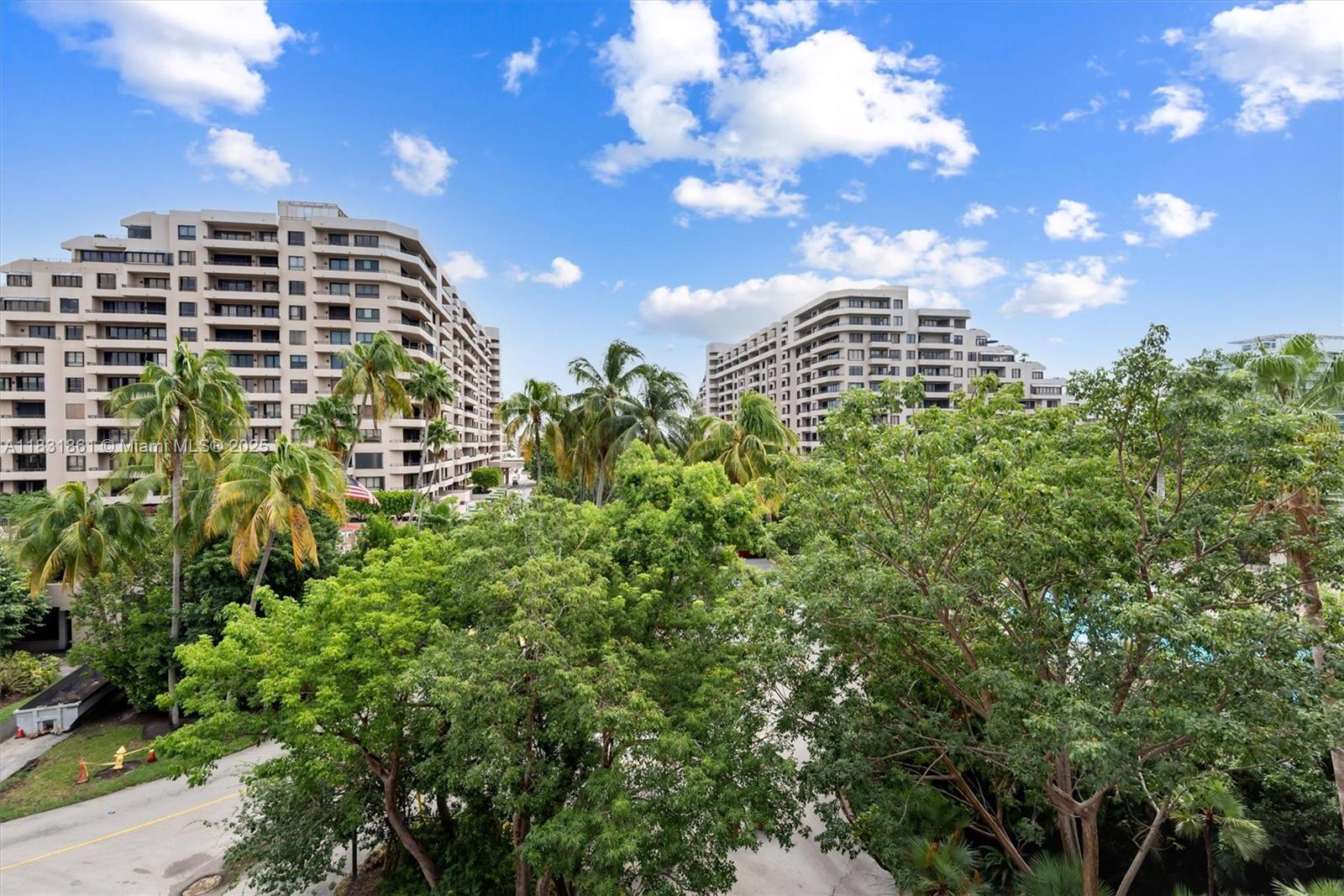 161 Crandon Boulevard, Unit 412 Key Biscayne, FL 33149 - Photo 15 of 15 a view of a city with tall trees