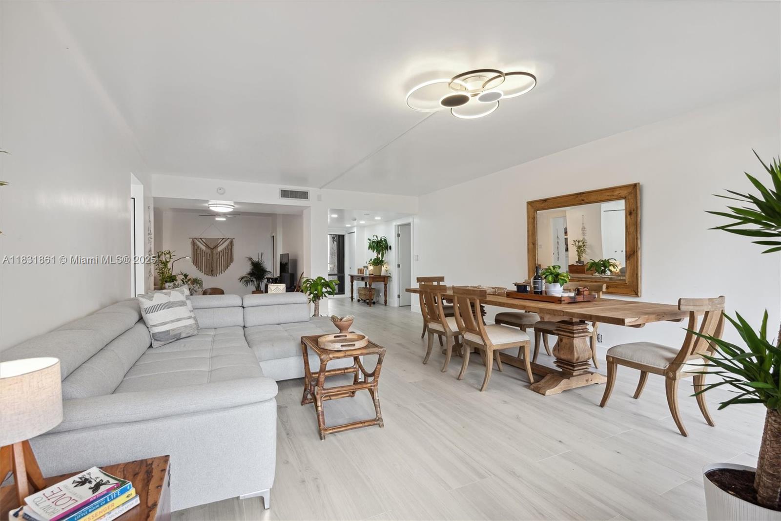 161 Crandon Boulevard, Unit 412 Key Biscayne, FL 33149 - Photo 3 of 15 a view of a dining room with furniture