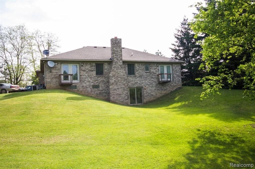 5990 Sutton Road Dryden, MI 48428 - Photo 4 of 24 Rear Exterior.jpg