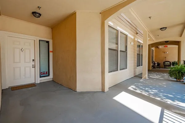 a view of livingroom with entryway and windows