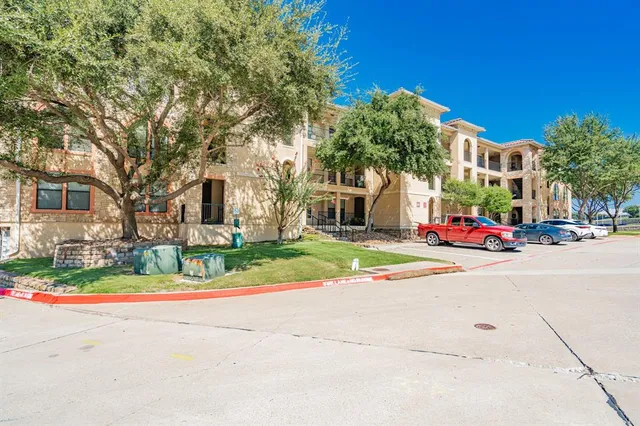 a view of road with houses