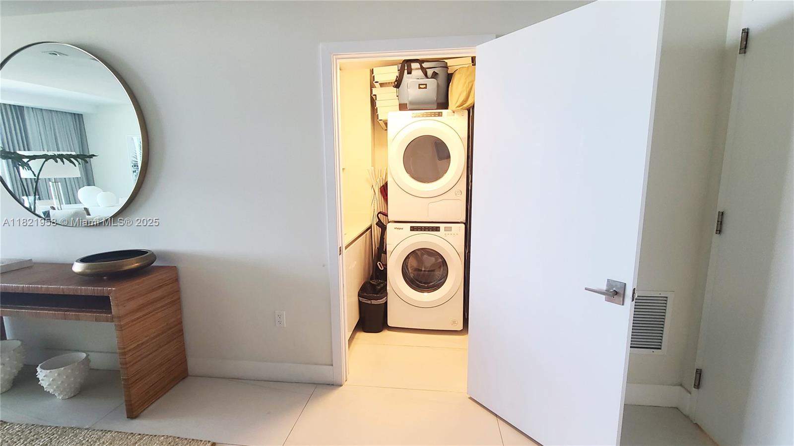 3100 North Ocean Drive, Unit 1206 Singer Island, FL 33404 - Photo 20 of 40 a utility room with dryer and washer