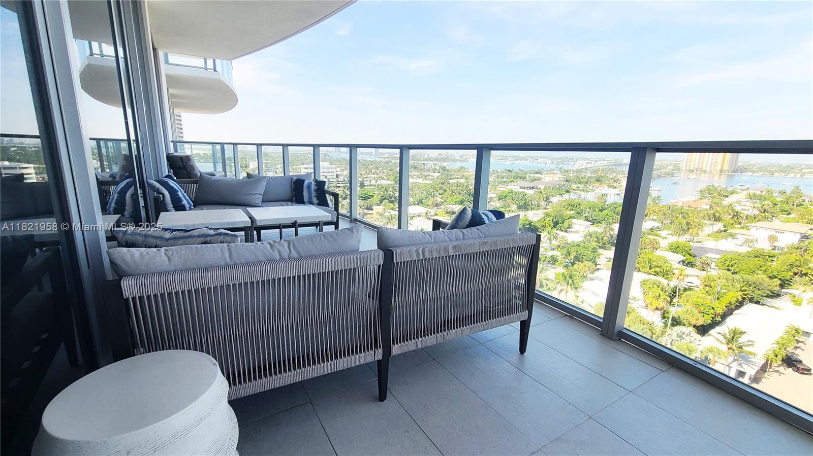 3100 North Ocean Drive, Unit 1206 Singer Island, FL 33404 - Photo 21 of 40 a living room with furniture and a floor to ceiling window