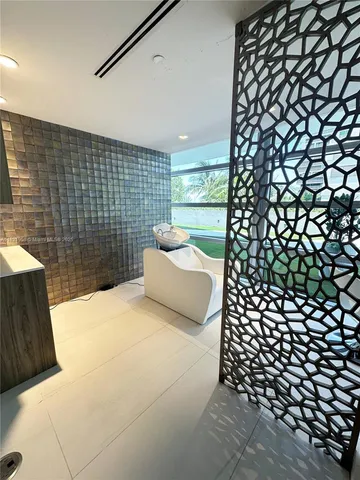 a swimming pool with buildings in front of it