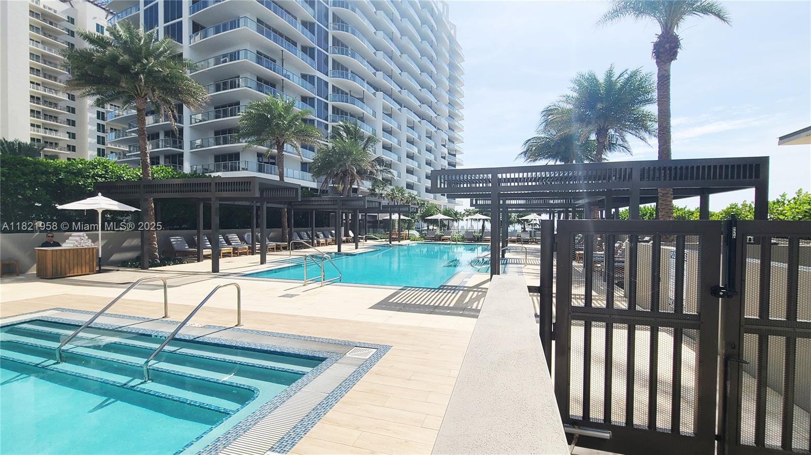 3100 North Ocean Drive, Unit 1206 Singer Island, FL 33404 - Photo 35 of 40 a view of a swimming pool with a patio
