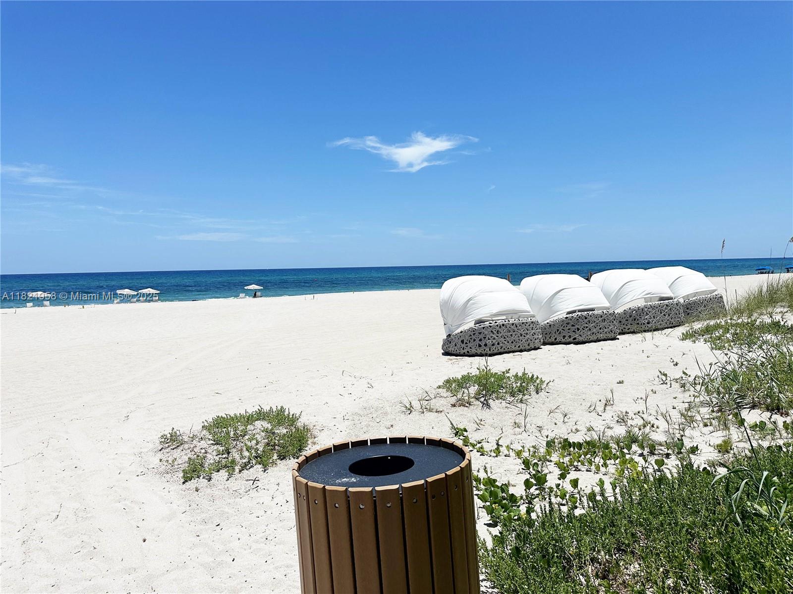 3100 North Ocean Drive, Unit 1206 Singer Island, FL 33404 - Photo 40 of 40 a bathroom with a sink and a mirror