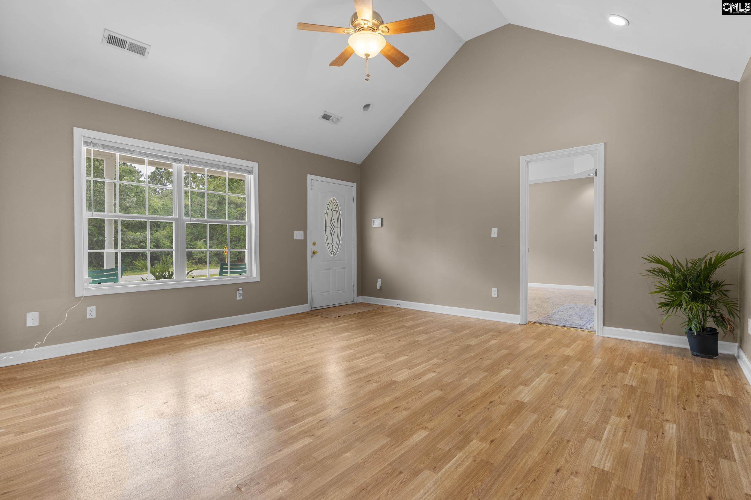 548 Eskie Dixon Road Elgin, SC 29045 - Photo 5 of 27 a view of an empty room with a window