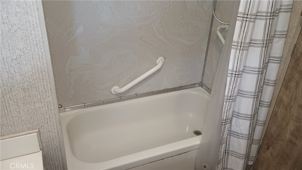 17800 Langlois Road Desert Hot Springs, CA 92241 - Photo 12 of 19 a bathroom with a shower
