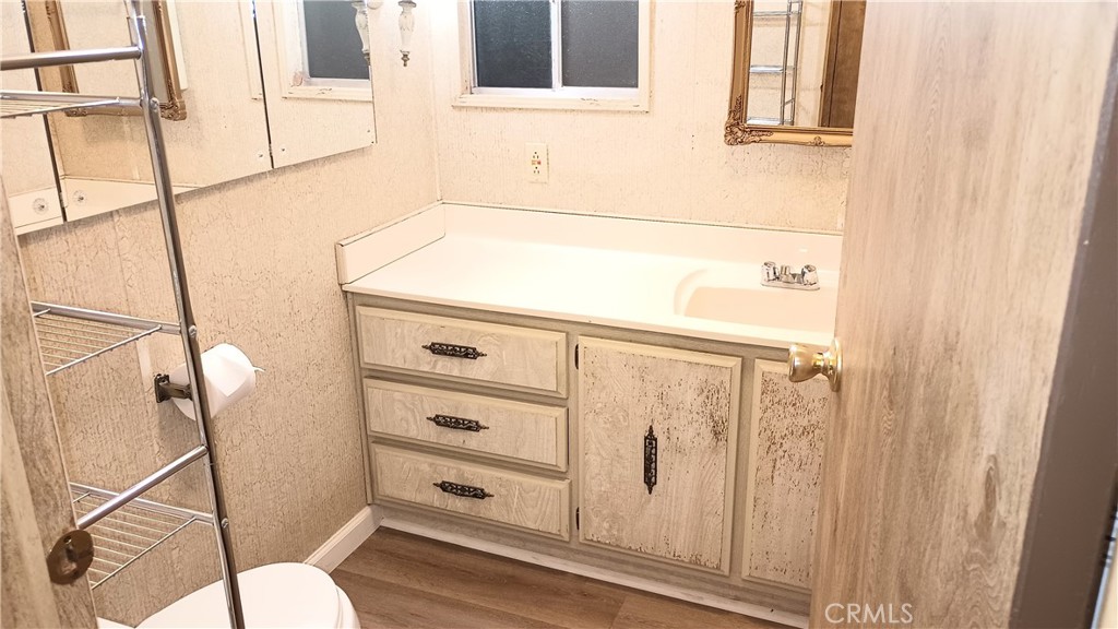 17800 Langlois Road Desert Hot Springs, CA 92241 - Photo 6 of 19 a bathroom with a sink and a mirror