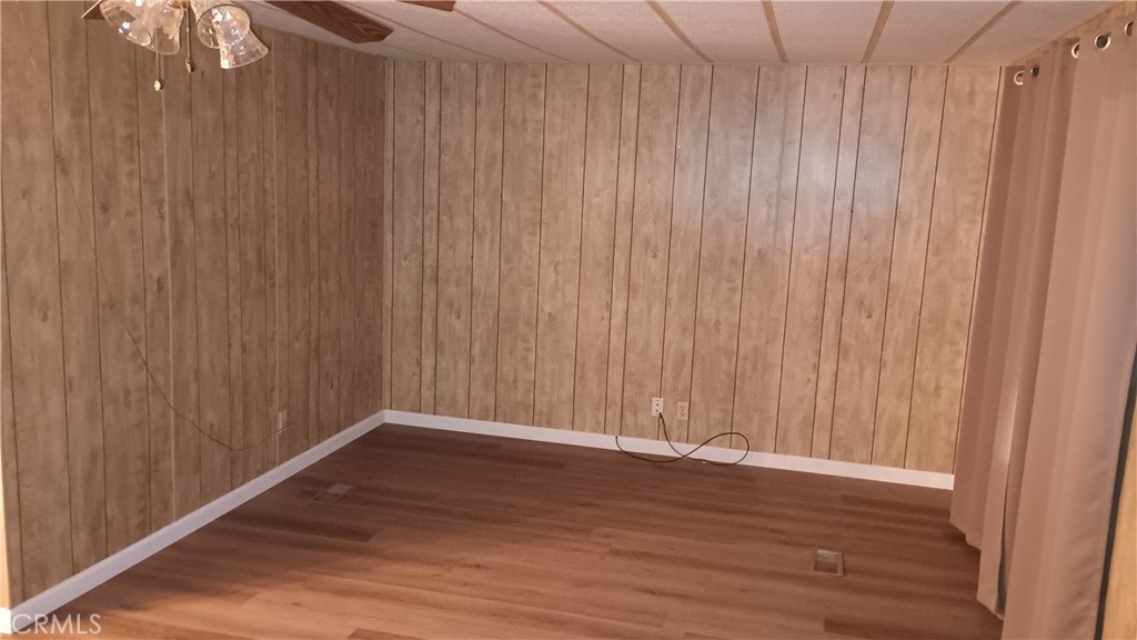 17800 Langlois Road Desert Hot Springs, CA 92241 - Photo 7 of 19 a view of a room with wooden floor