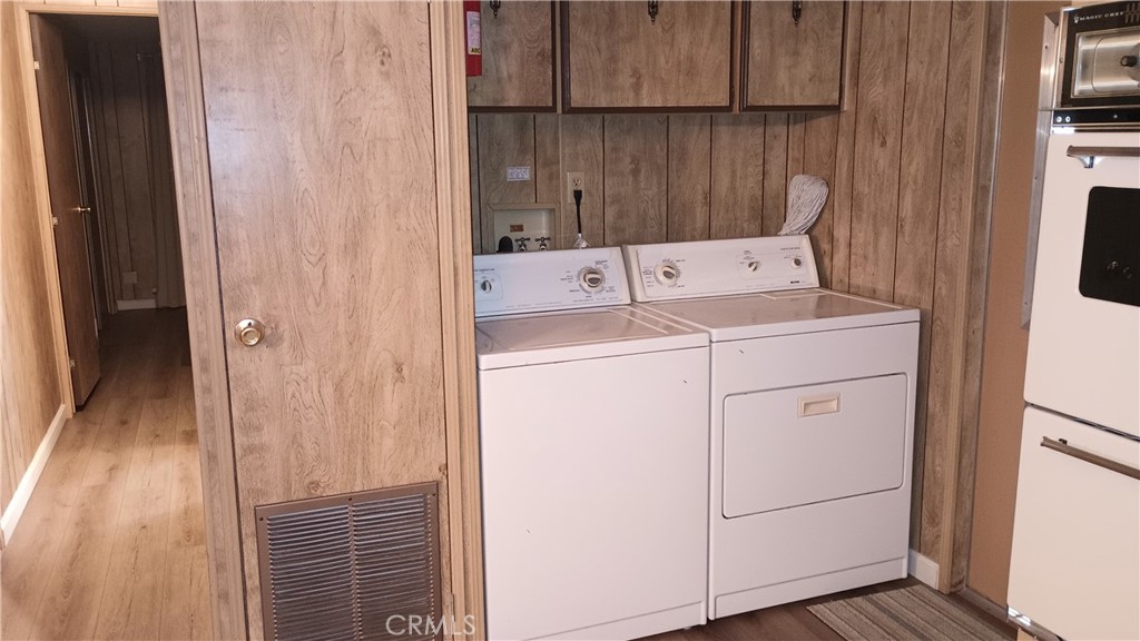 17800 Langlois Road Desert Hot Springs, CA 92241 - Photo 10 of 19 a utility room with dryer and washer