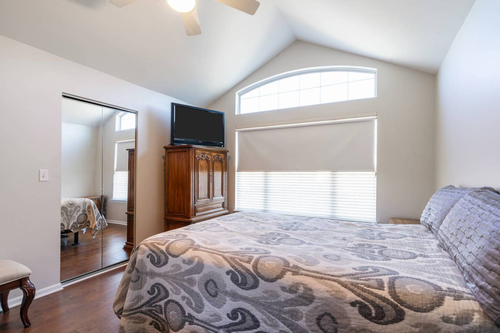 232 Manor Drive Buffalo Grove, IL 60089 - Photo 16 of 21 a bedroom with a large bed and a window