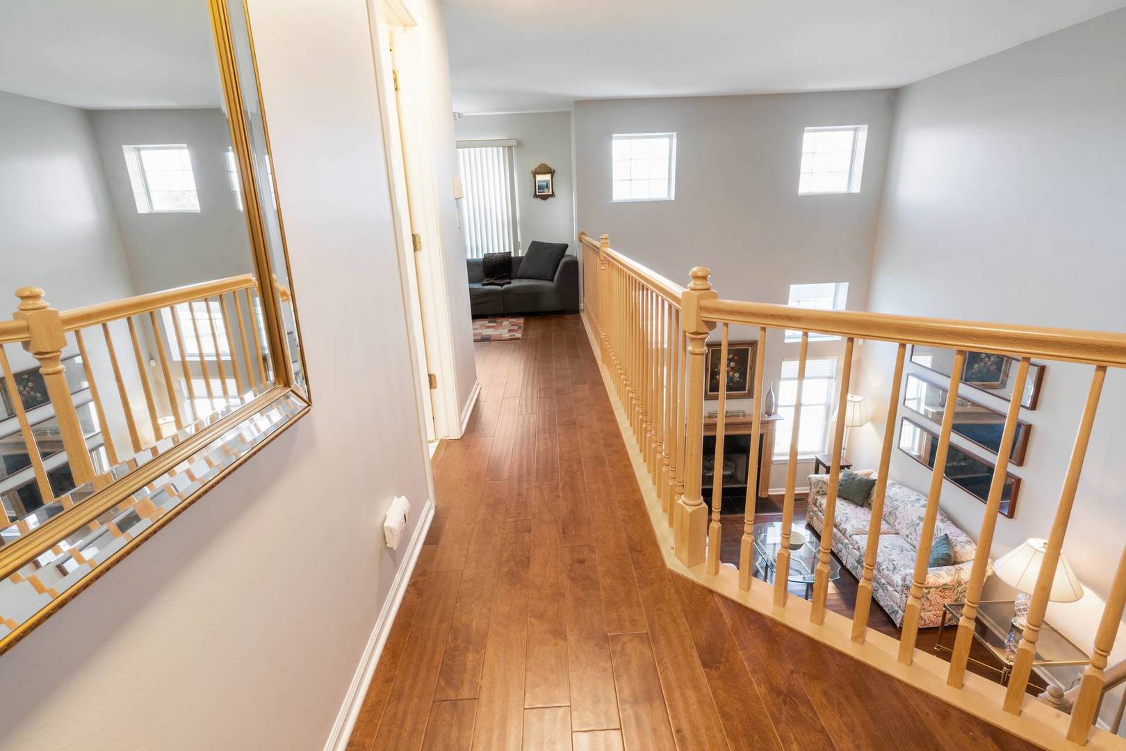 232 Manor Drive Buffalo Grove, IL 60089 - Photo 10 of 21 a view of an entryway with wooden floor and stairs