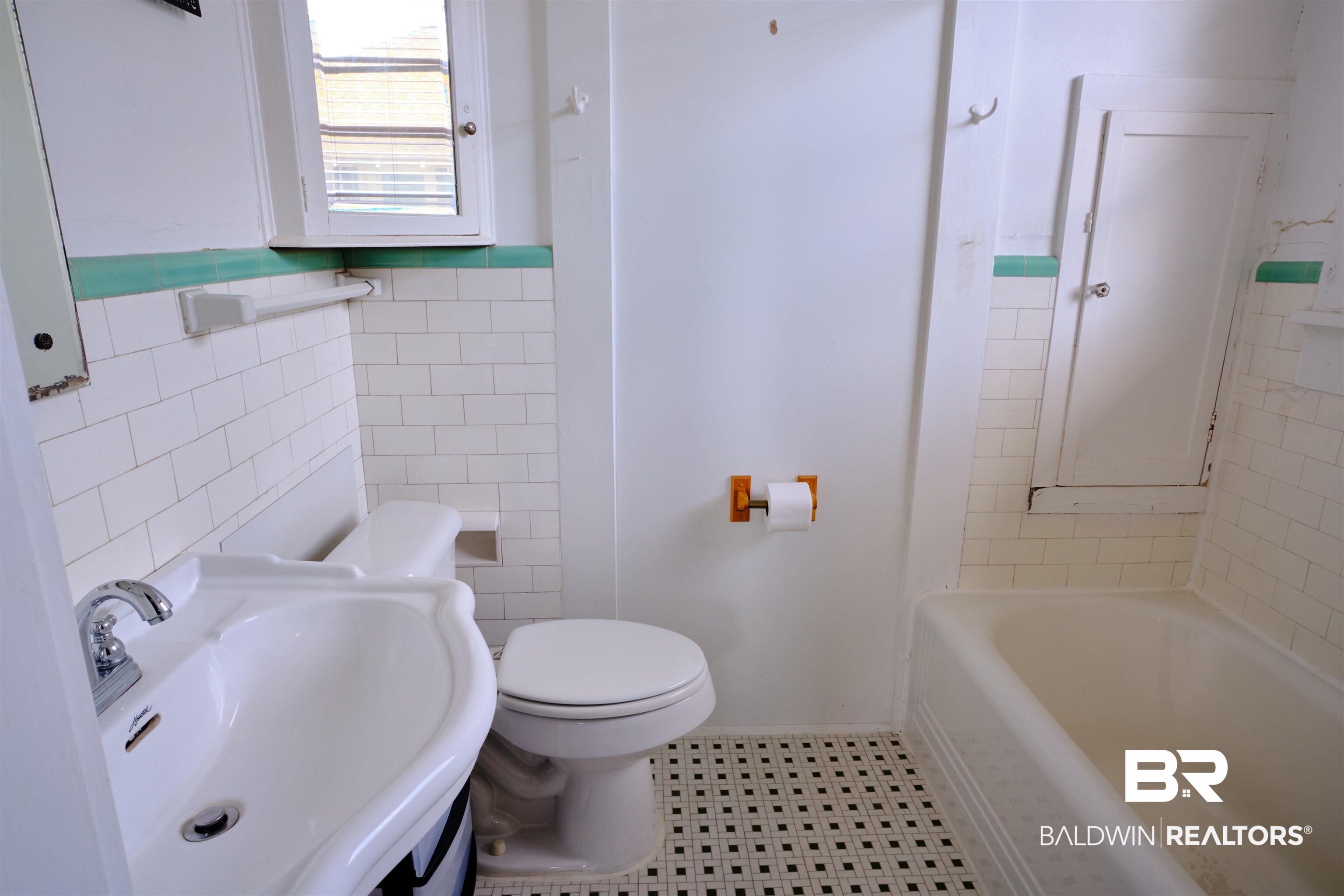 101 West Horner Street Atmore, AL 36502 - Photo 31 of 38 Bathroom with sink, toilet, tile patterned floors, and tile walls