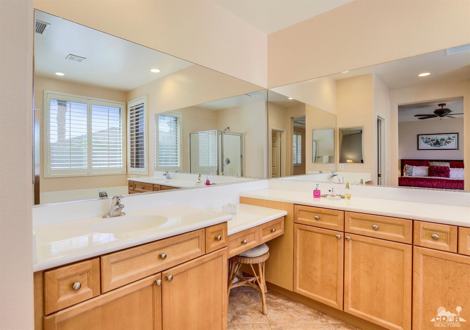 83313 Lone Star Road Indio, CA 92203 - Photo 13 of 23 a bathroom with a sink and a mirror