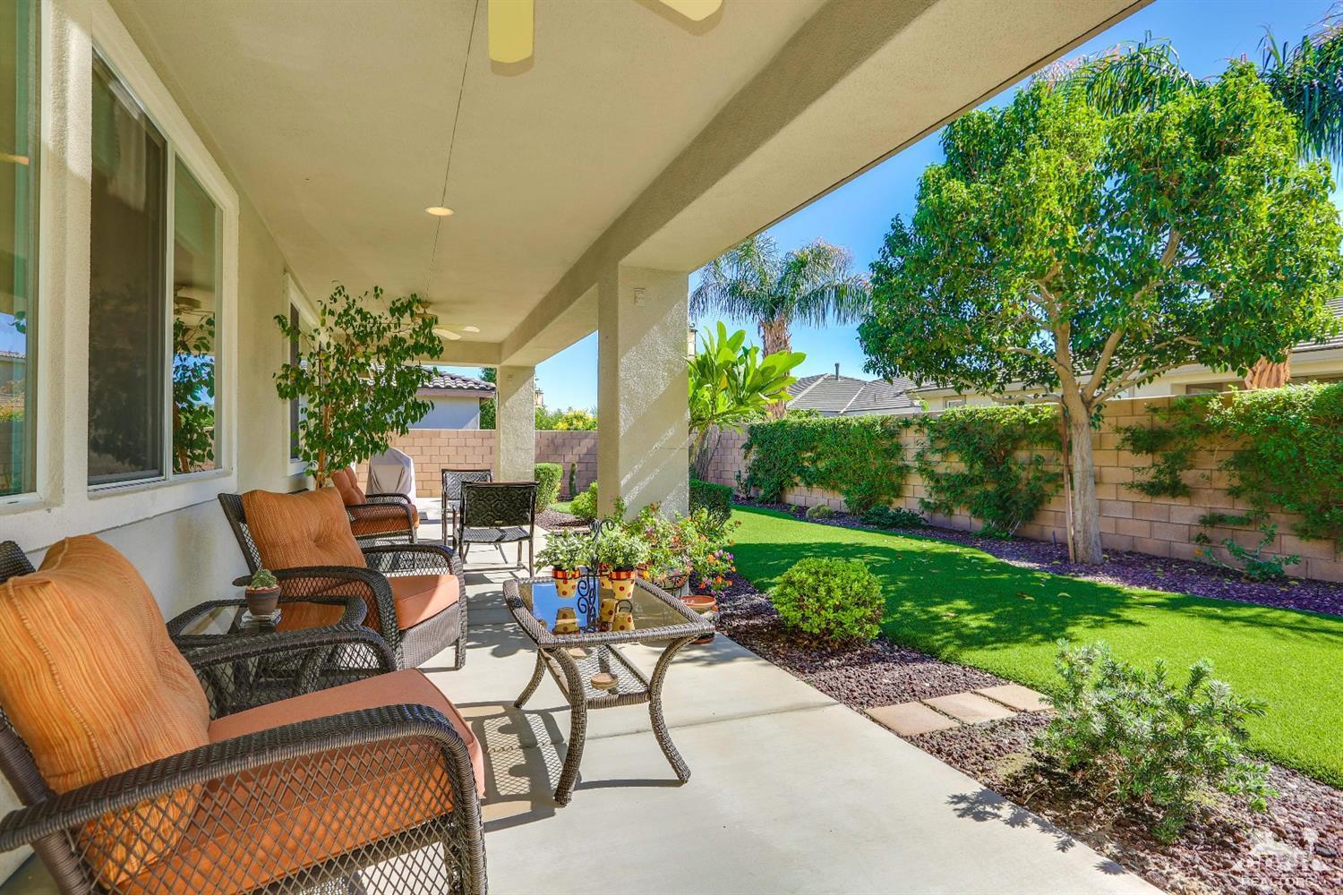 83313 Lone Star Road Indio, CA 92203 - Photo 9 of 23 a view of a patio with plants and chairs