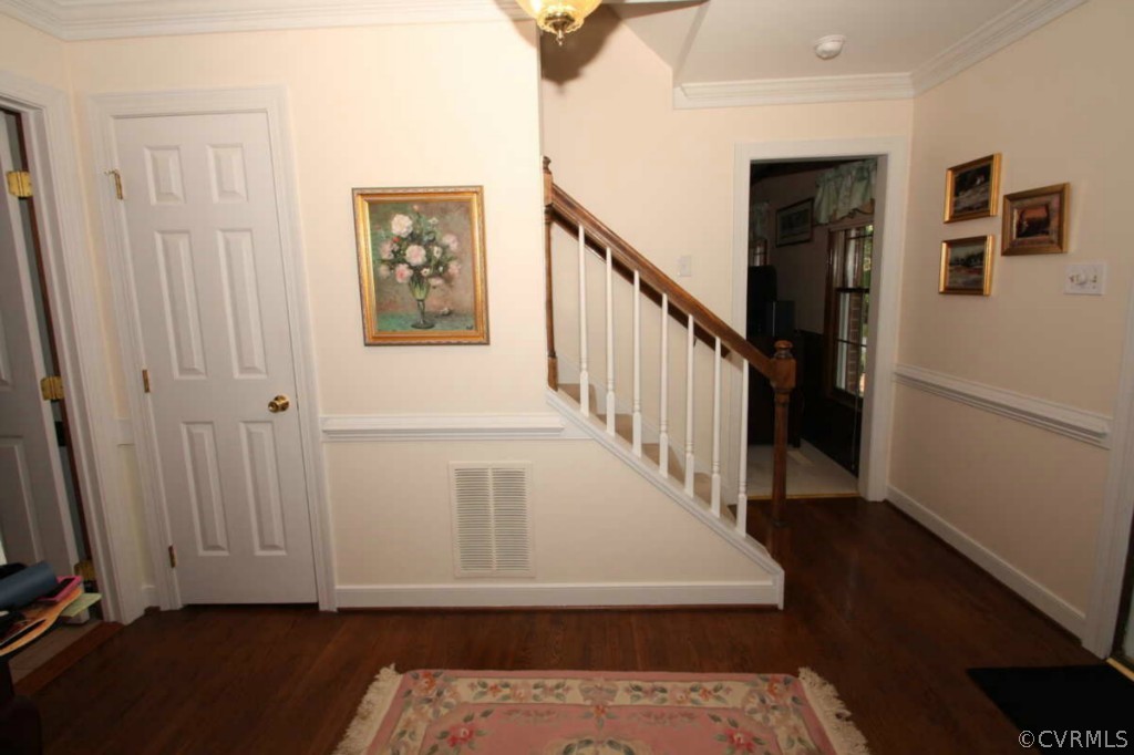 2141 Corner Rock Road Midlothian, VA 23113 - Photo 15 of 22 a view of a hallway with wooden floor and stairs