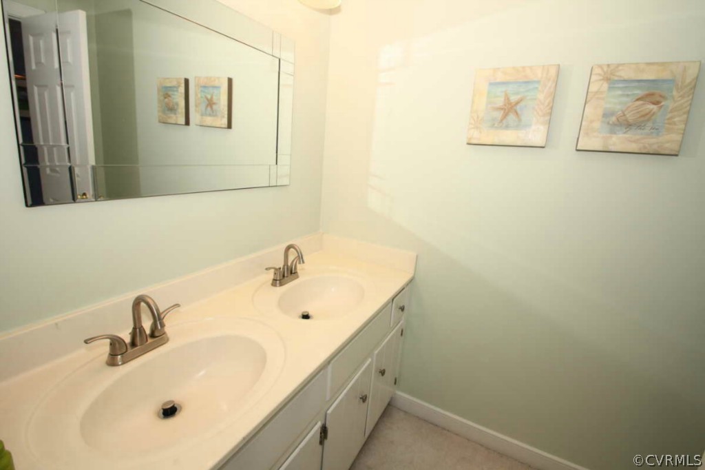 2141 Corner Rock Road Midlothian, VA 23113 - Photo 16 of 22 a bathroom with a sink and a tub
