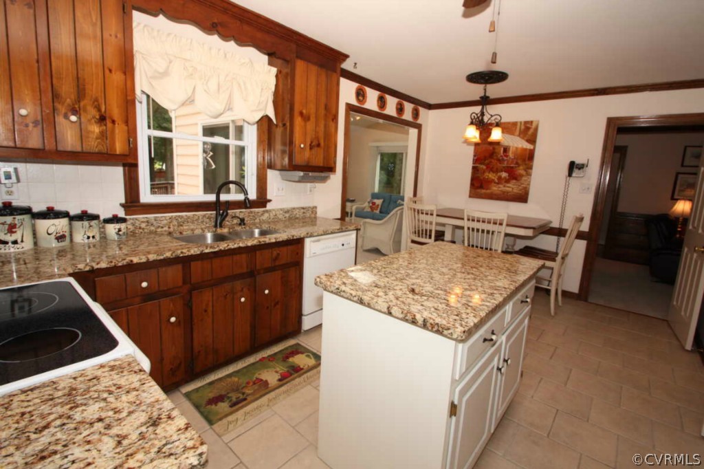 2141 Corner Rock Road Midlothian, VA 23113 - Photo 6 of 22 a kitchen with stainless steel appliances granite countertop a sink stove and refrigerator