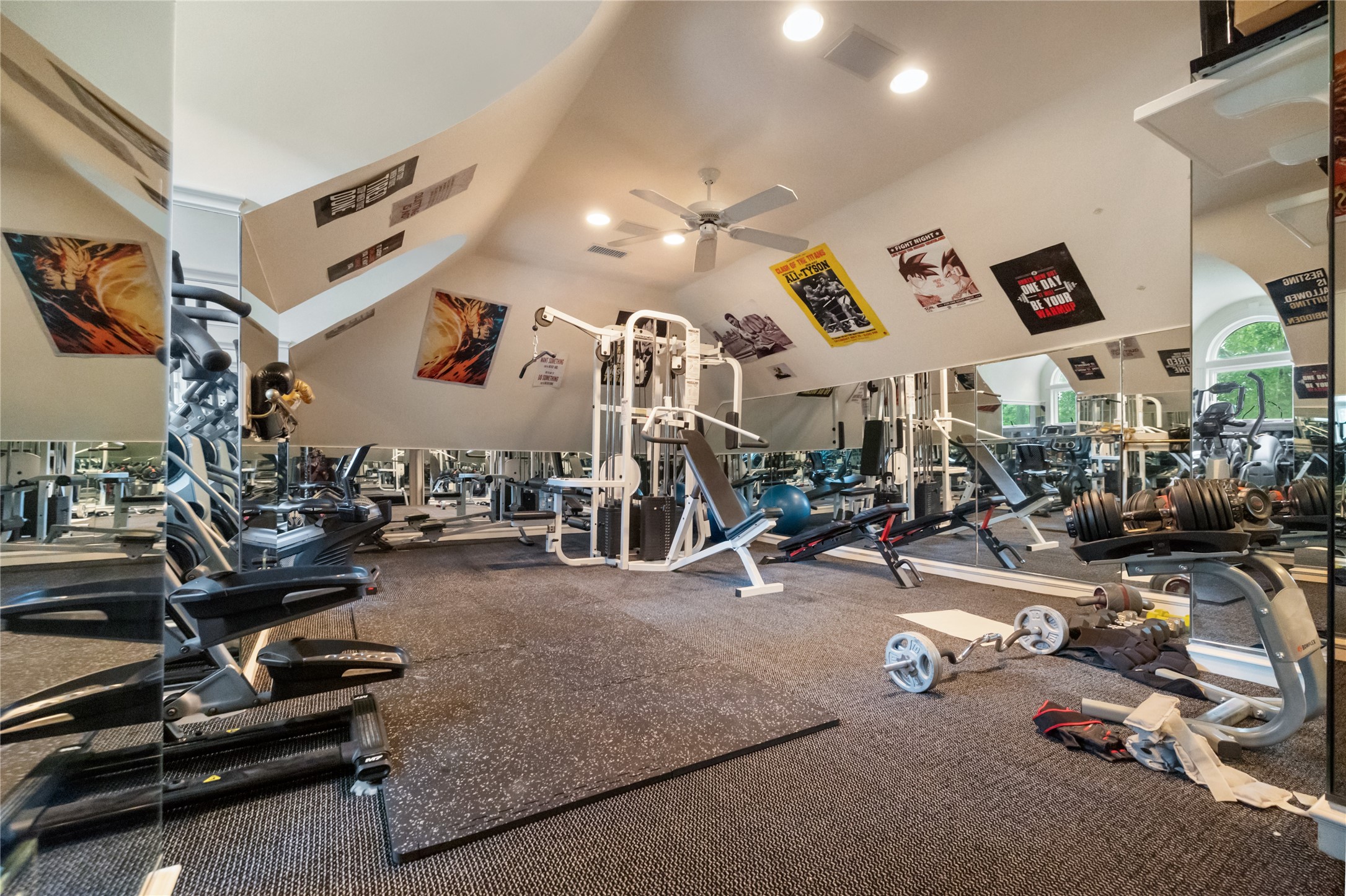 205 Grogans Point Road The Woodlands, TX 77380 - Photo 19 of 49 a view of a room with gym equipment