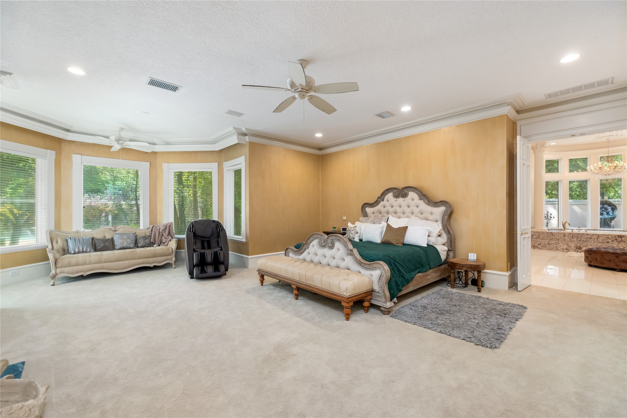 205 Grogans Point Road The Woodlands, TX 77380 - Photo 20 of 49 a living room with furniture and a large window