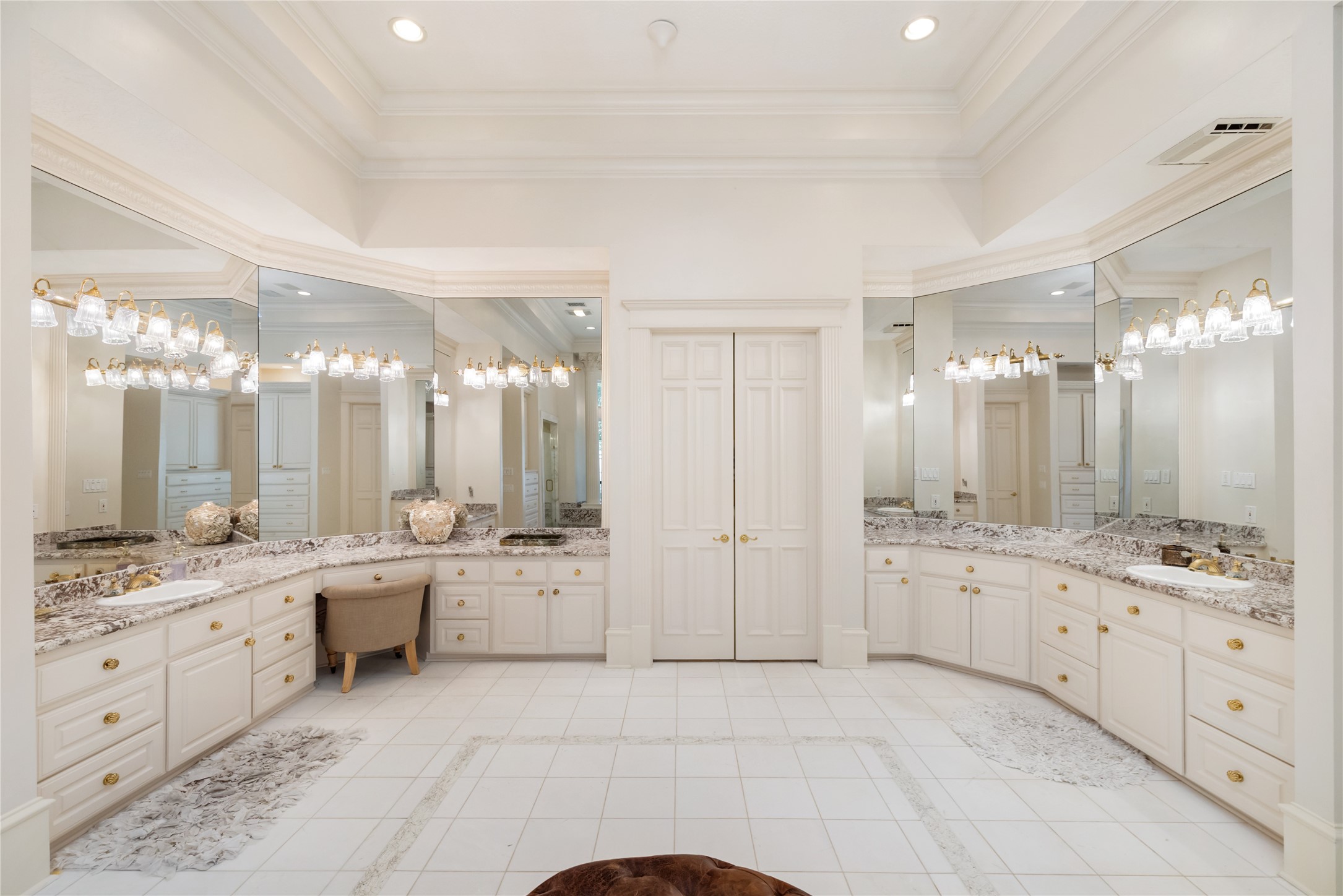205 Grogans Point Road The Woodlands, TX 77380 - Photo 23 of 49 a large bathroom with a large mirror vanity and shower